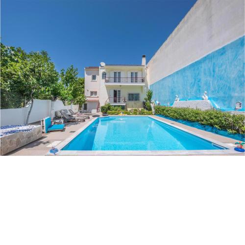 Stunning home in Lechaio Corinthias with Outdoor swimming pool, WiFi and 4 Bedrooms